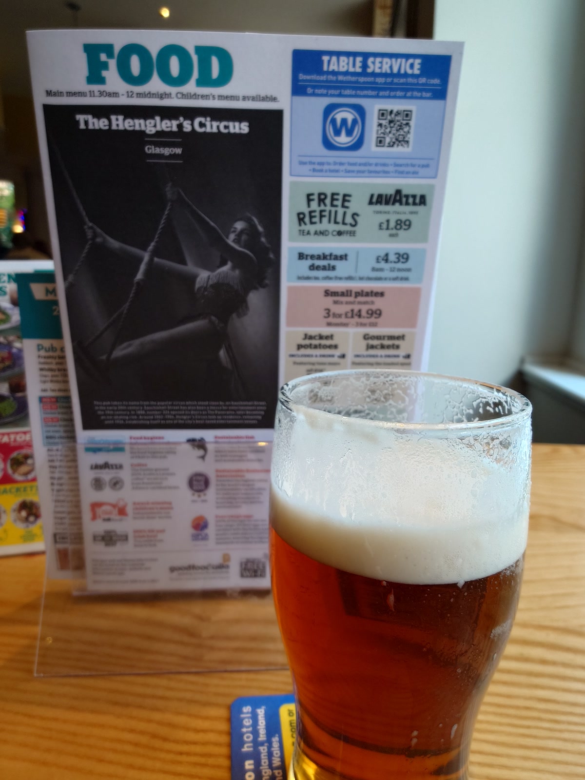 Pint and menu card at The Hengler's Circus